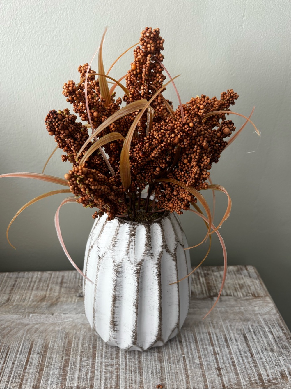 Kirklands Orange Rust Faux Berry Arrangement in White Textured Vase